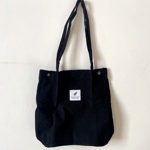 new in packaging black corduroy ‘you need this one, take care of laundry…